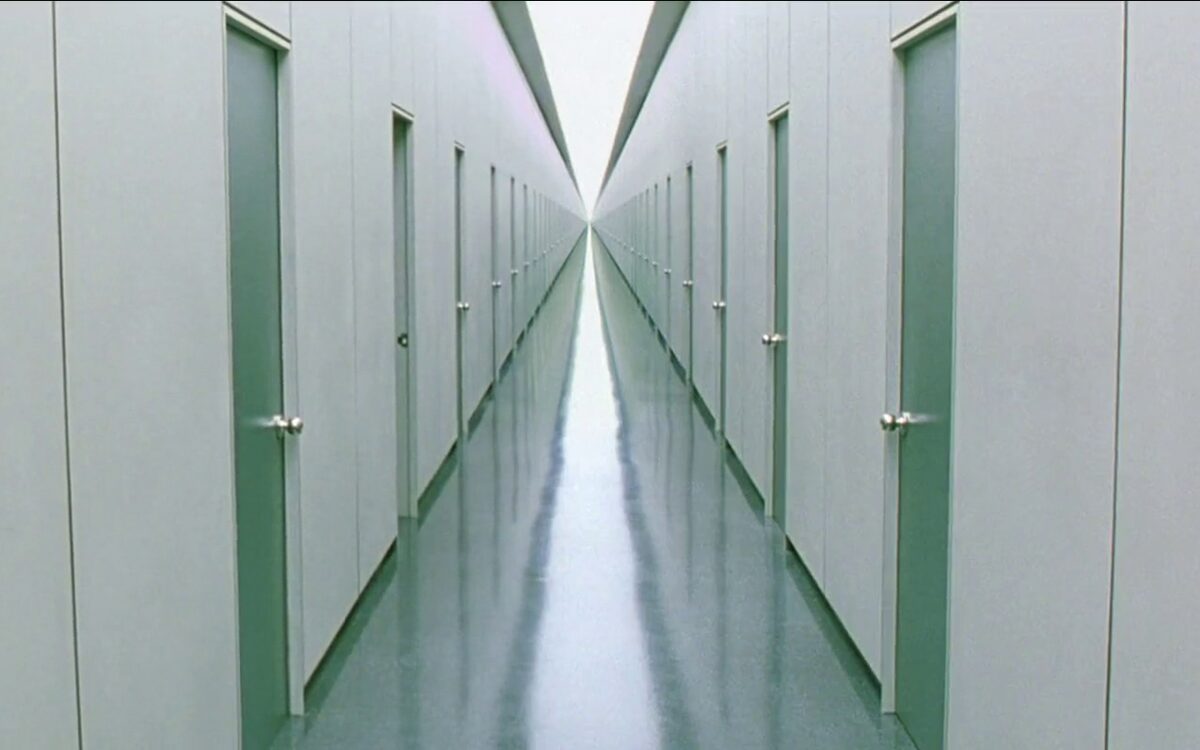 A hallway of identical doors as a metaphor for identity-gated internal connectivity